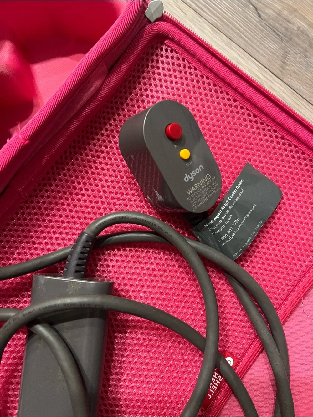 Dyson charcoal and pink travel case hair dryer with attachments